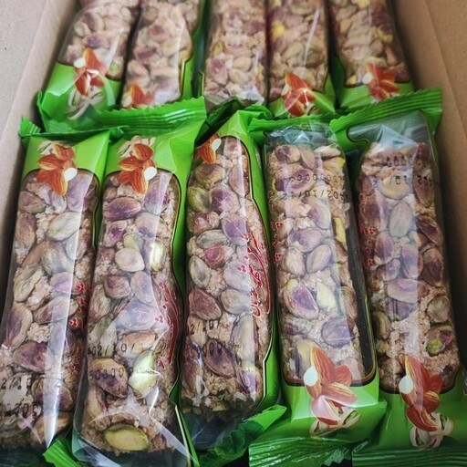 بار کنجدی تزئین پسته و بادام  شیرین شهد سته بان